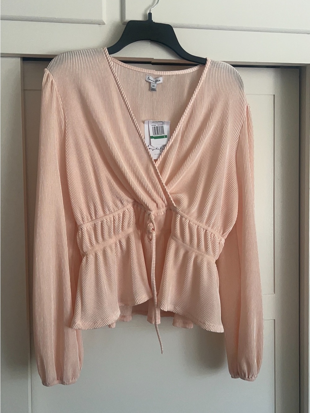 Size Large Junior’s Cream Love Fire long sleeve wrapped blouse V neck NWT